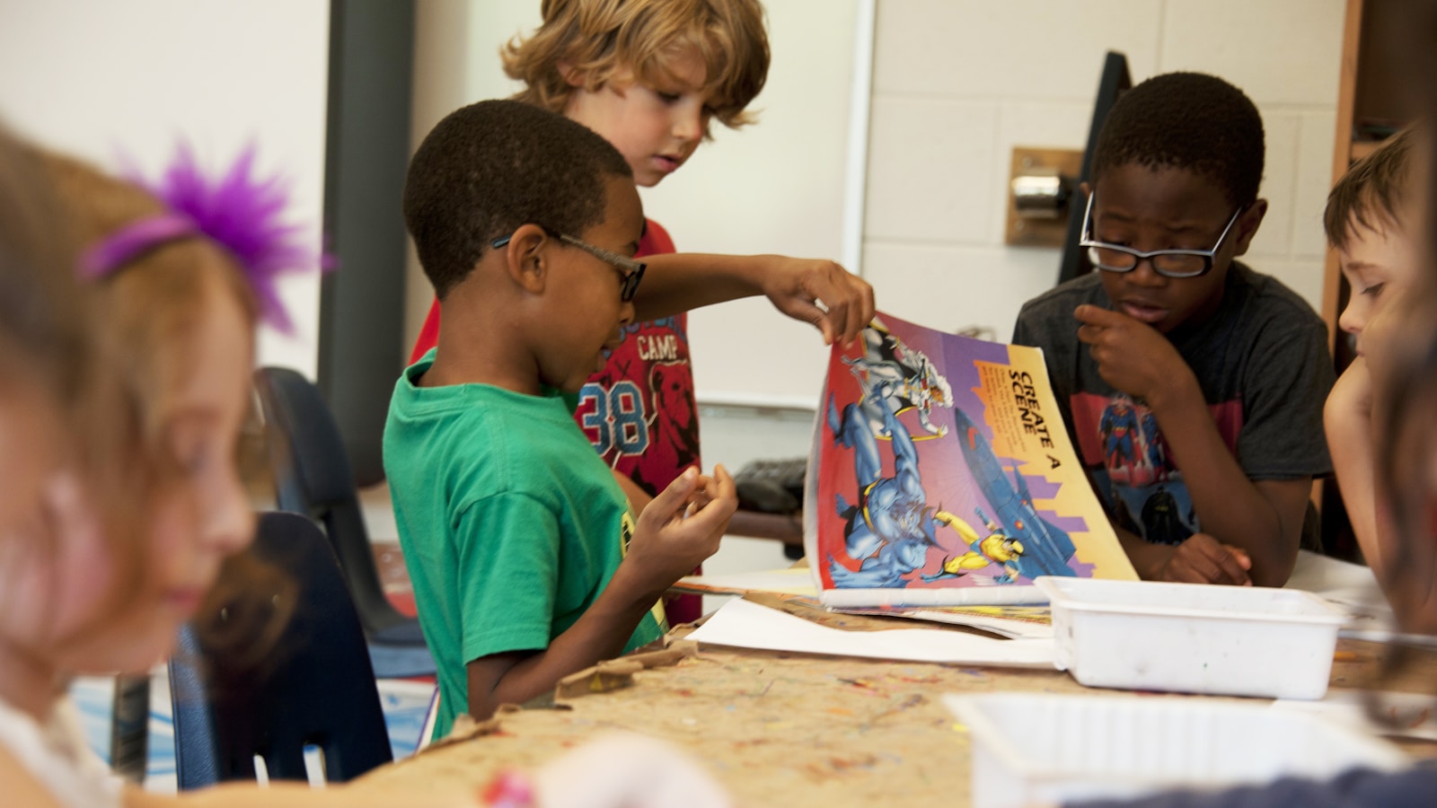 Teacher engaging with classroom of children